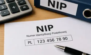 Dokument z numerem NIP, kalkulator i segregator. Czy każdy ma NIP? To pytanie o numer identyfikacji podatkowej.